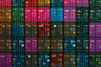 red and black plastic crates by Teng Yuhong courtesy of Unsplash.