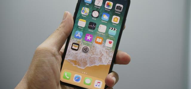 person holding space gray iPhone 7 by Bagus Hernawan courtesy of Unsplash.