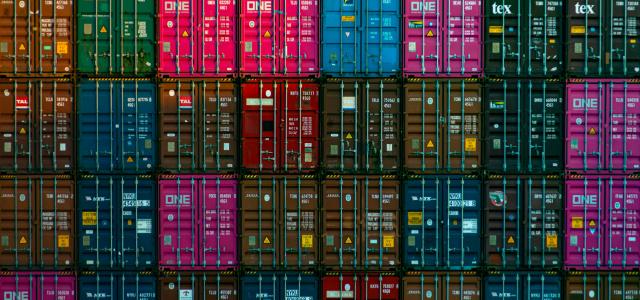 red and black plastic crates by Teng Yuhong courtesy of Unsplash.