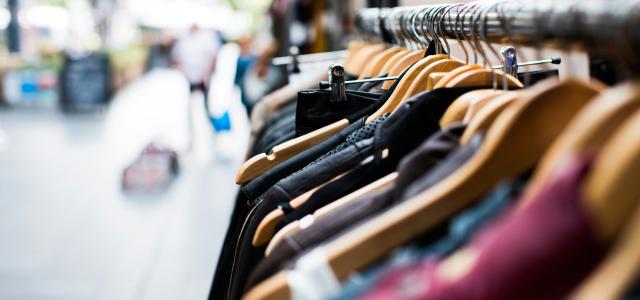 selective focus photography of hanged clothes by Artificial Photography courtesy of Unsplash.